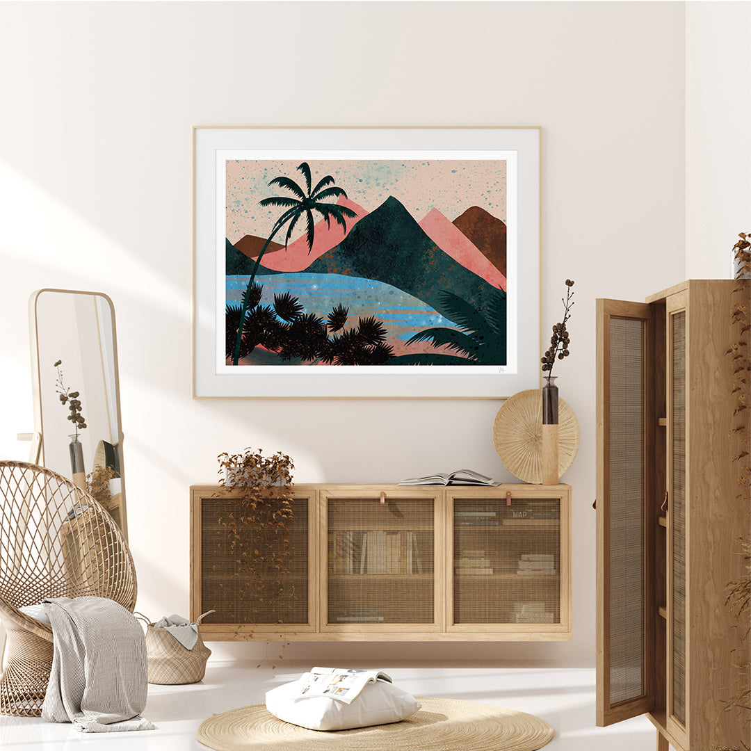 Framed artwork of a tropical landscape in a modern living room.