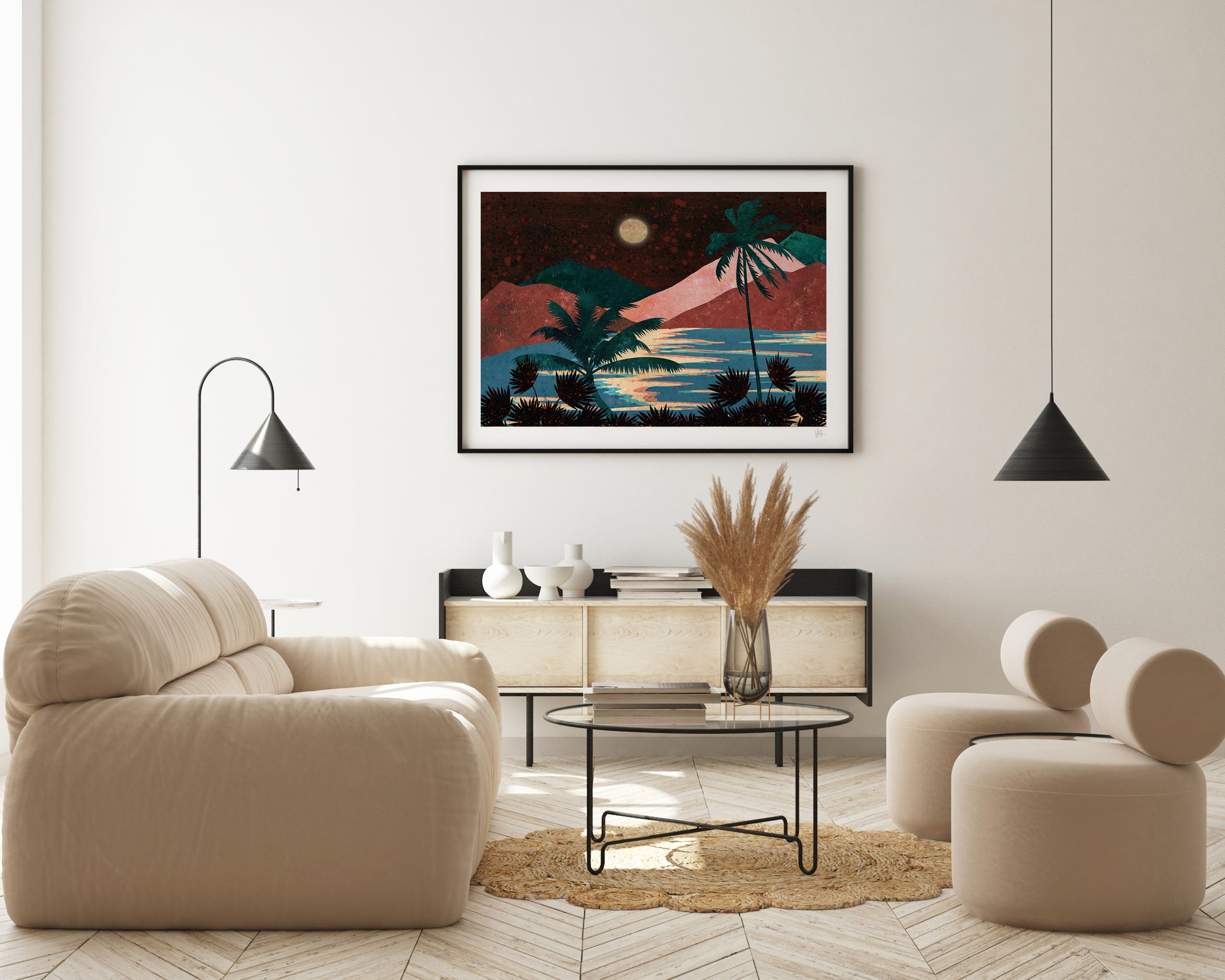 Modern living room with beige sofa, round ottoman, and framed artwork on the wall.