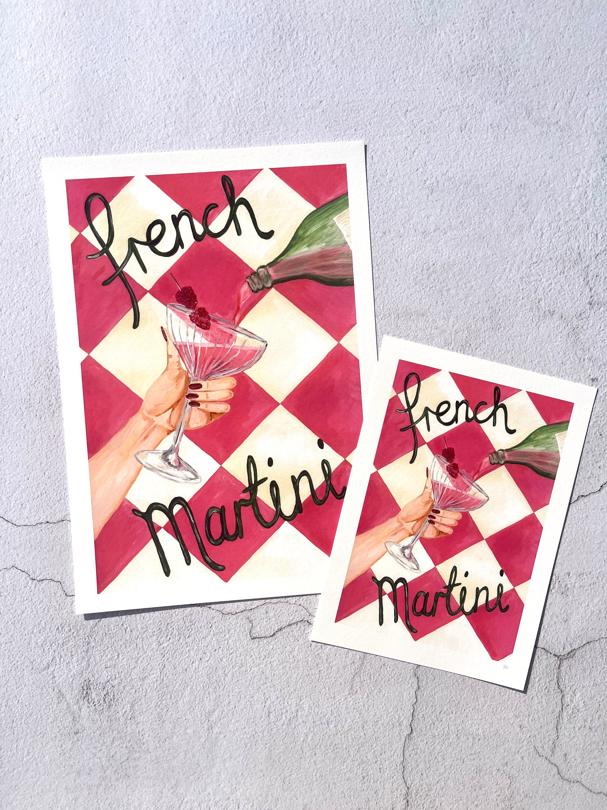 Two cards with a 'French Martini' design featuring a hand holding a martini glass on a checkered background.