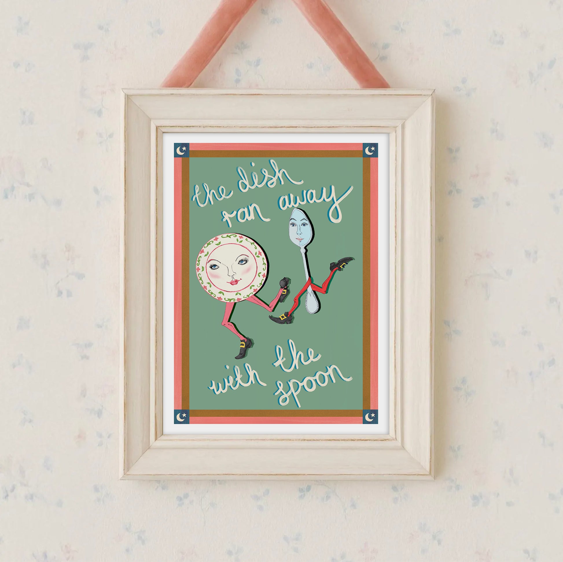 Framed artwork with a spoon and plate illustration and text on a light background