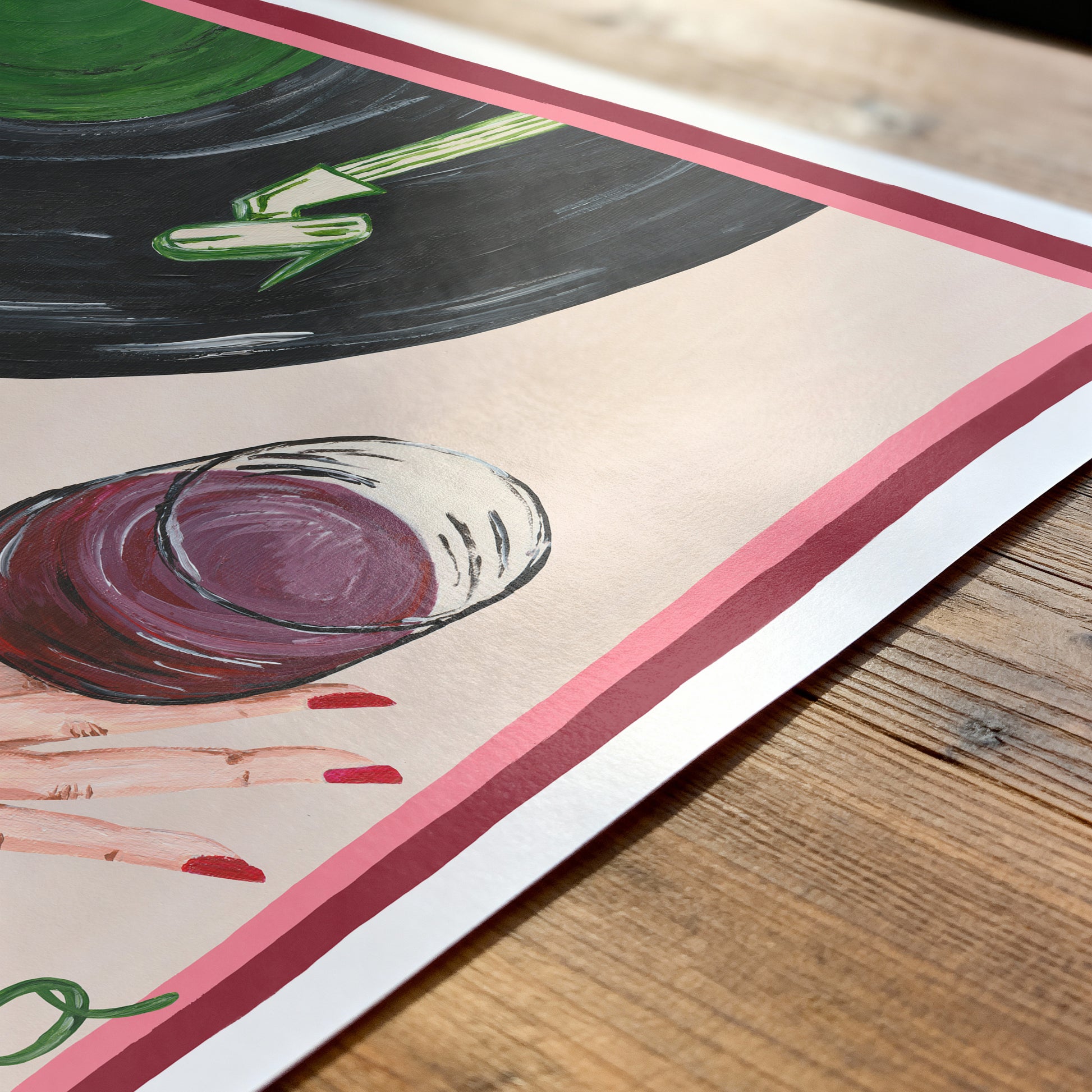 Artistic depiction of a glass of red wine with green leaves on a wooden surface